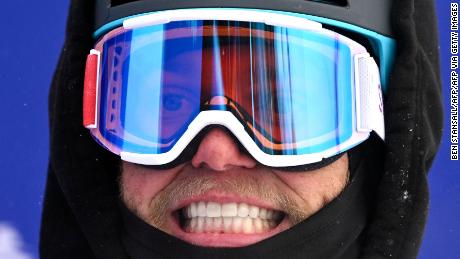 Britain's Gus Kenworthy reacts as he competes in the men's free skating qualifier in the Half-Pipe during the Beijing 2022 Winter Olympics at Genting Snow Park H&B;  S Stadium in Zhangjiakou on February 17, 2022.