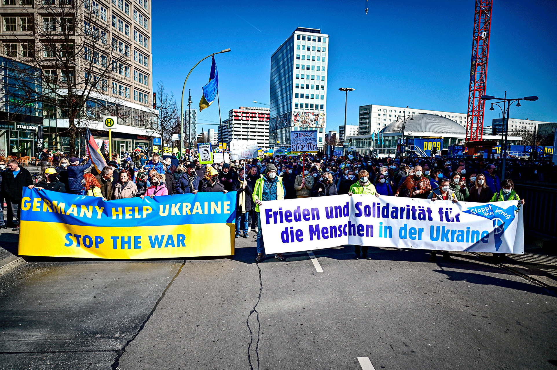 people participate in "Stop the war!  Peace and solidarity for the people of Ukraine" A demonstration in Berlin, Germany, Sunday, March 13, 2022.