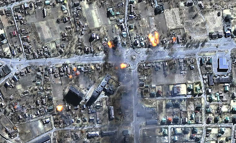 Houses on fire in Chernihiv, Ukraine.