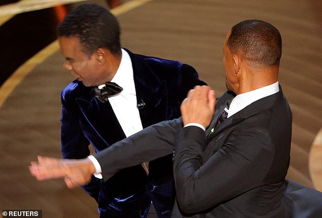 The women of The View were discussing the infamous slapping incident between Will Smith (left) and Krist Rock at the Oscars on Sunday.