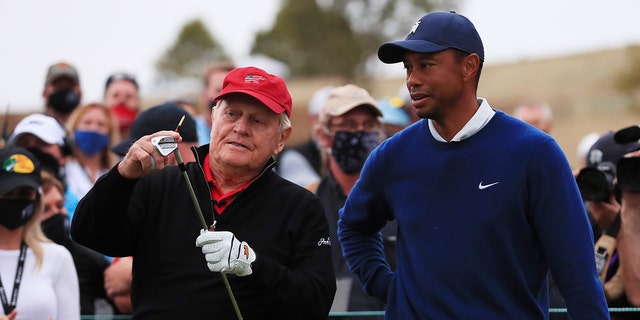 Jack Nicklaus talks with Tiger Woods of the United States in Game 19 during the Pine Valley Cup on September 22, 2020 at Pine Valley Stadium at Big Cedar Lodge in Ridgedale, Missouri.