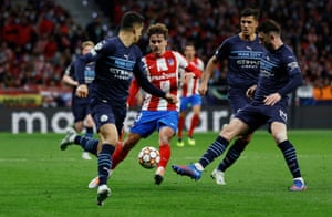 Antoine Griezmann of Atletico Madrid against Aymeric Laporte of Manchester City.