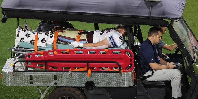 Joey Magnifico #86 of the Michigan Panthers is taken off the field with an injury in the second quarter of a game against the New Jersey Generals at Protect Stadium on April 22, 2022 in Birmingham, Alabama. 