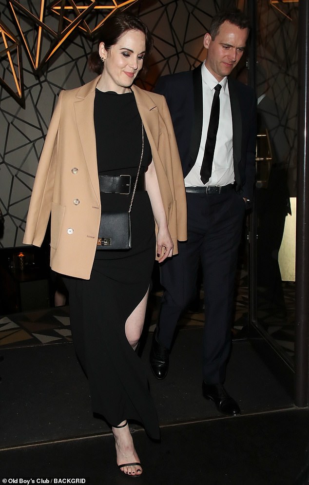 Fun: The engaged couple were in a London hot spot after the launch of Downton Abbey: A New Era, in Leicester Square, earlier in the evening.