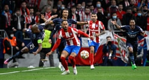 Manchester City's Fernandinho (left) is fouled by Matthews Cunha of Atletico Madrid (second from the left).