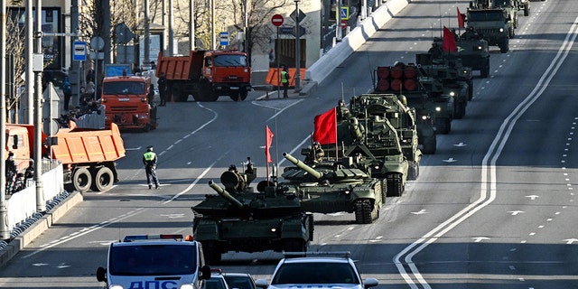 A Russian T-90M tank (front) and other military vehicles drive along the Garden Ring towards Red Square at the rehearsal of the D-Day military parade in central Moscow, May 4, 2022 (Photo by Kirill KUDRYAVTSEV/AFP) (Photo by KIRILL KUDRYAVTSEV/AFP via Getty Images)