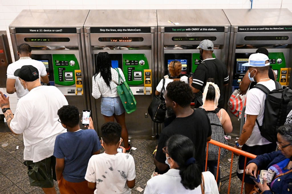 Some fans waited up to four hours to purchase MetroCards with a picture of the late rapper Biggie Smalls.