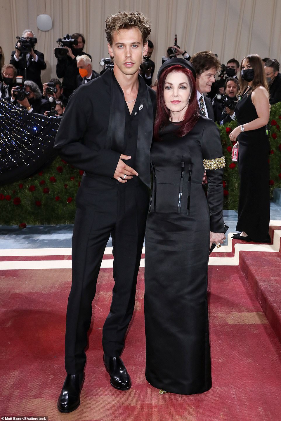 Still has it: Priscilla Presley, 76, surprised in a mostly black group as she walked the carpet at the Met Gala in Manhattan on Monday with Austin Butler, 30, who plays ex-husband Elvis Presley in a new biopic