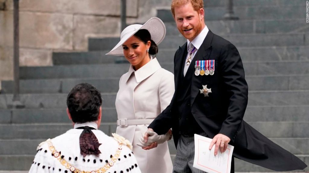 Meghan, Duchess of Sussex, arrives at the Jubilee Party in an elegant white outfit