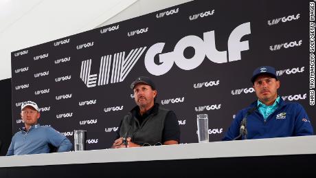 Mickelson speaks at a press conference, seated alongside Justin Harding and Chase Kupka.