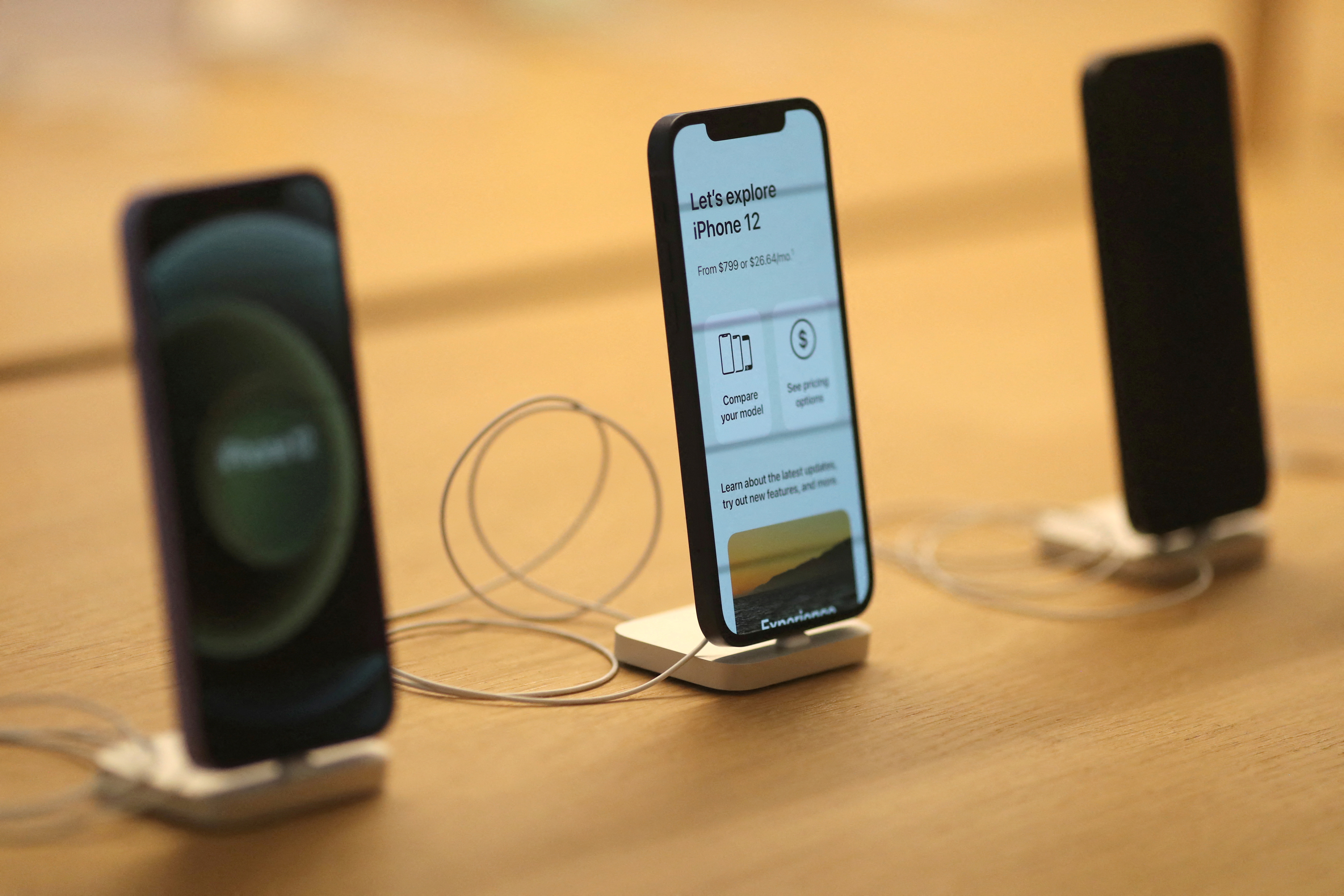 iPhone 12 phones appear at the new Apple Store on Broadway in downtown Los Angeles